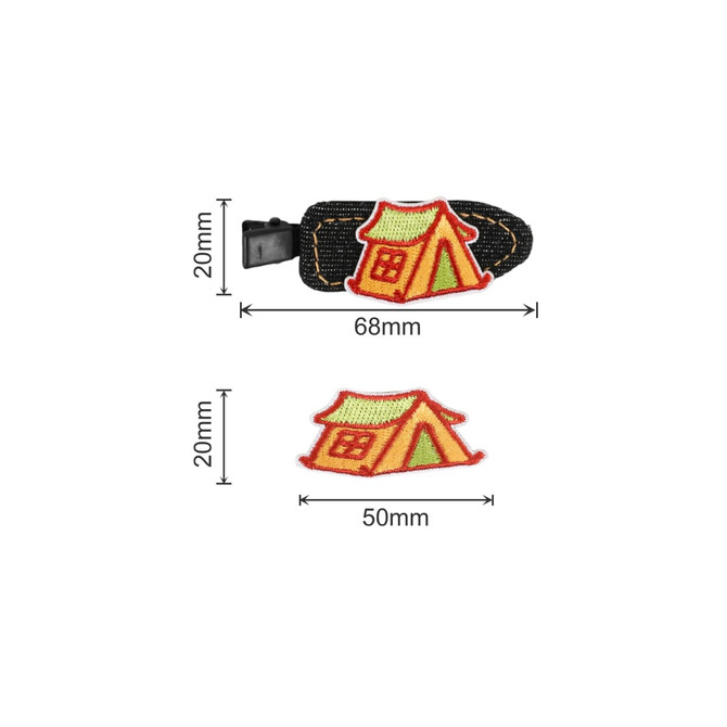 A denim hair clip featuring an embroidered design of a colourful tent, with a secure clasp and measuring 68mm.