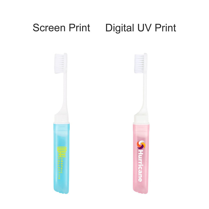 A transparent foldable handle toothbrush in blue and pink, featuring bristles and a logo on each.