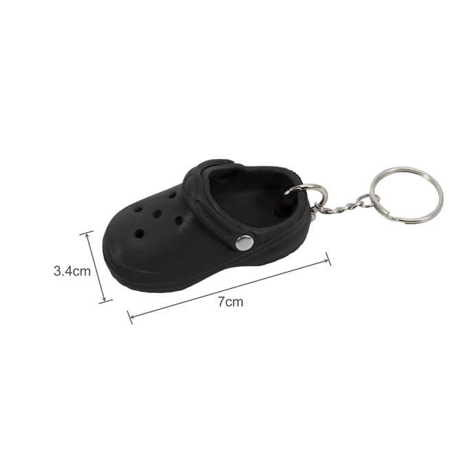 A black clog shoe keyring made of rubber, measuring 7cm in length and 3.4cm in height, attached to a keychain.