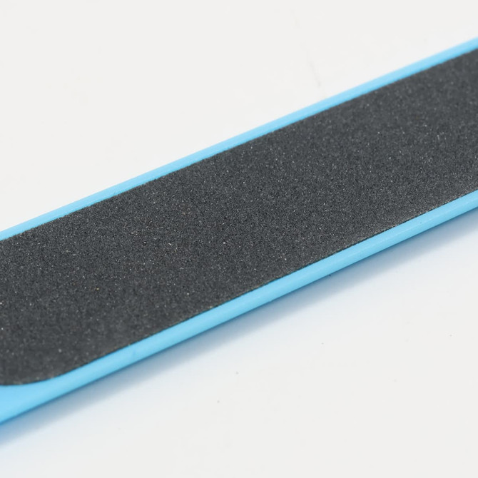 A nail file with a blue edge and a black sanding surface, featuring a simple design and branding.