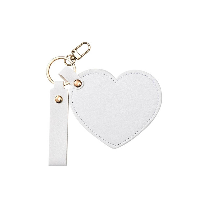 A white heart-shaped compact mirror with a keychain and a white strap, featuring a metallic clasp.