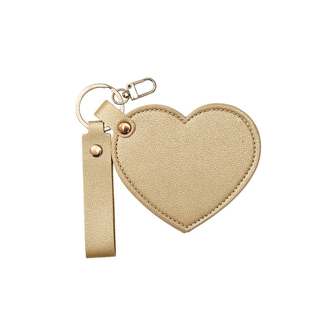 A gold heart-shaped compact mirror with a keychain attachment and a wrist strap. It features a simple metallic texture.