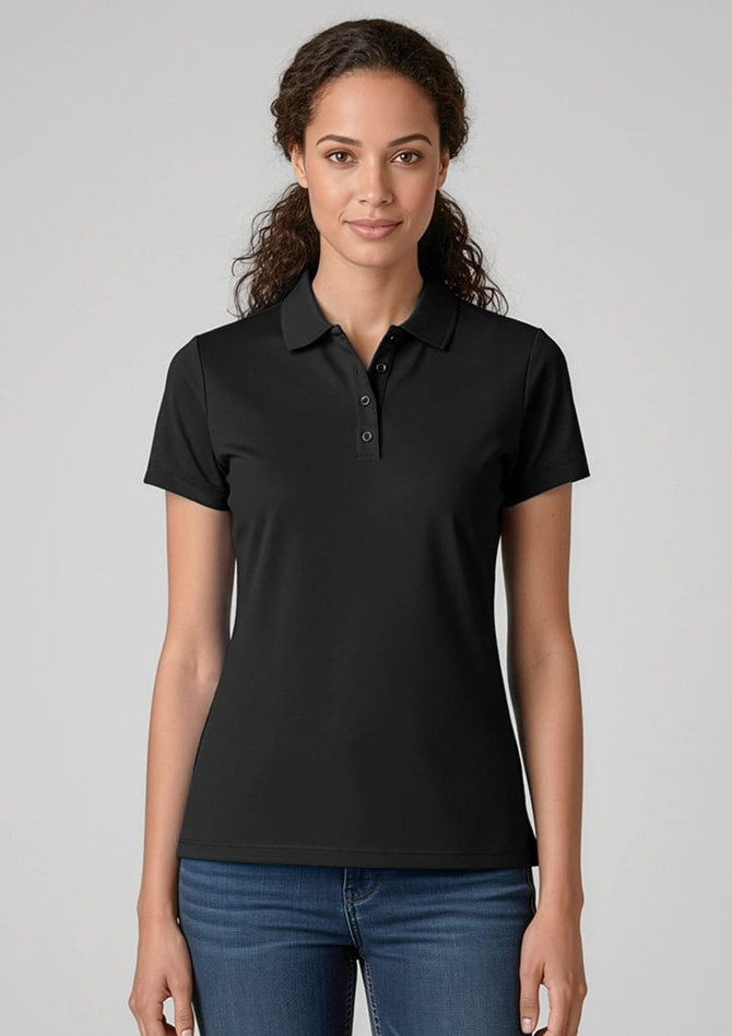 A black women's short sleeve polo shirt with a collar, featuring a logo on the chest. Model is wearing jeans.