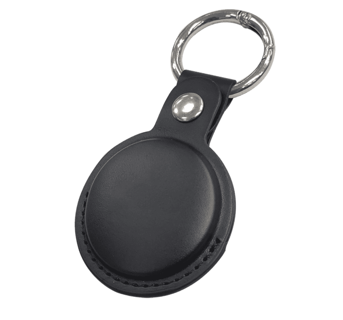 A black tracking tag with a leather-like case and metal keyring attachment.