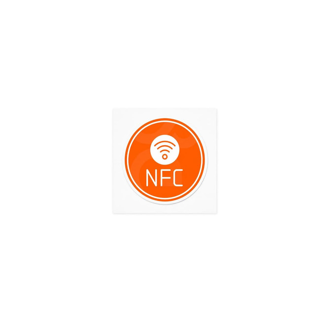An orange circular sticker featuring an NFC symbol and the letters "NFC" in white.