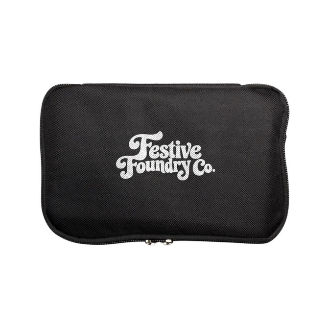 A black zippered case with a logo featuring the words "Festive Foundry Co." in white.