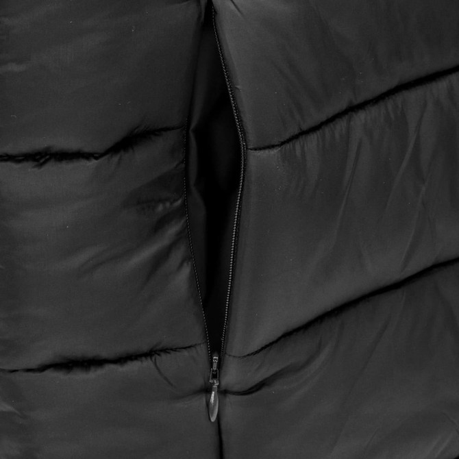 A black puffer vest featuring a zippered pocket, showcasing its quilted texture and sleek design.