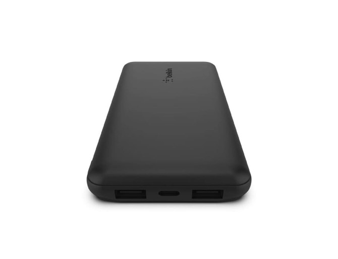 A black power bank with two USB ports and a USB-C port, featuring a logo on the surface.