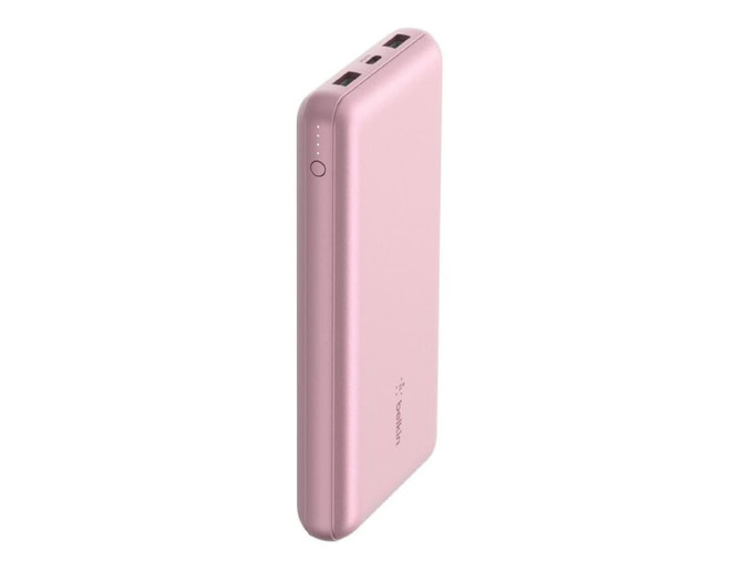 A pink power bank with dual USB ports and a built-in indicator light, featuring a branding logo.