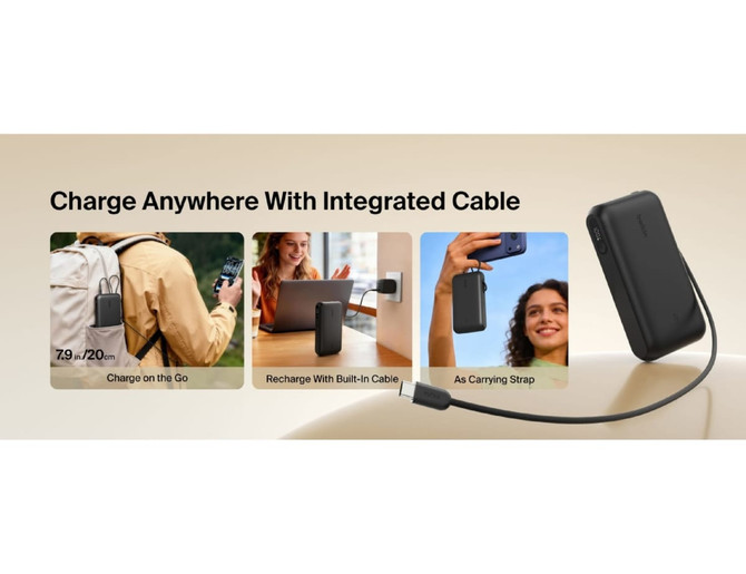 A power bank in black with an integrated cable and display, featuring a carrying strap.