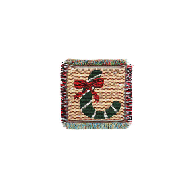 A Jacquard coaster featuring a festive green candy cane design with a red bow, fringed edges, and a beige background.