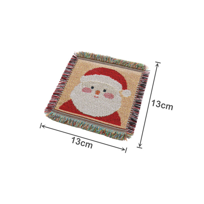 A festive Jacquard Coaster with a Santa design, featuring red, white, and multicoloured fringes. Measures 13cm x 13cm.