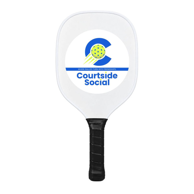 A white pickleball paddle with a black handle and a logo featuring a green ball and blue text.