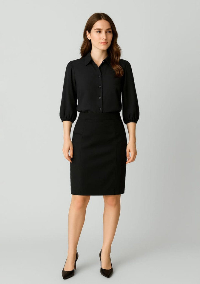 A black mid-waist pencil skirt paired with a matching black blouse, featuring a logo on the garment.