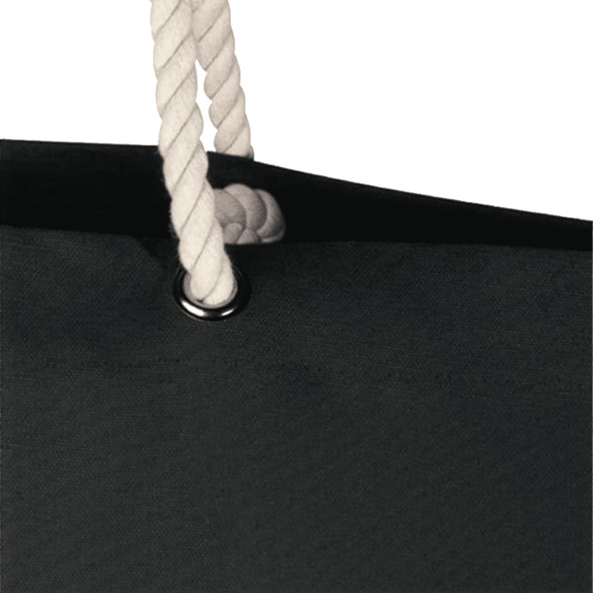 A black beach tote bag with a white rope handle and a silver eyelet. It features a simple, modern design.