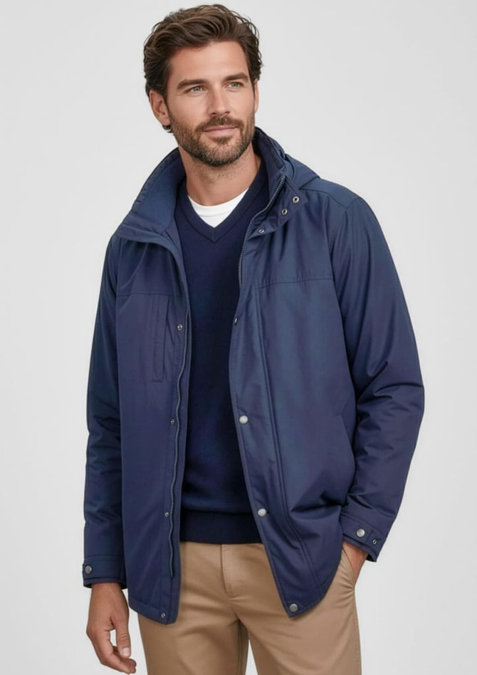 A navy men's comfort jacket with a hood, featuring a zip and snap button closure, and a logo.
