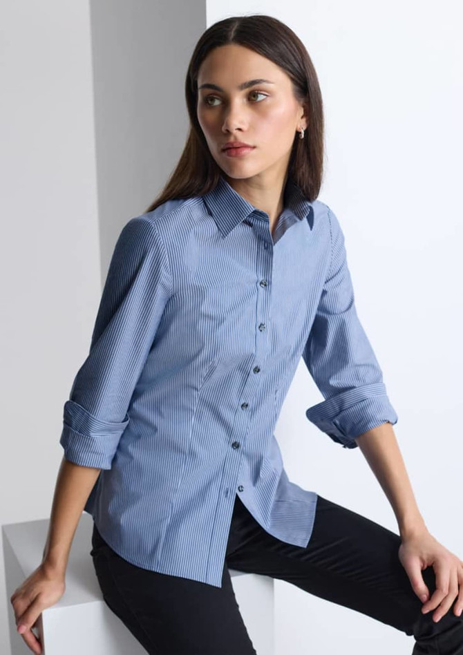 A long sleeve women's shirt in a blue striped pattern, featuring a collar and button-down front.