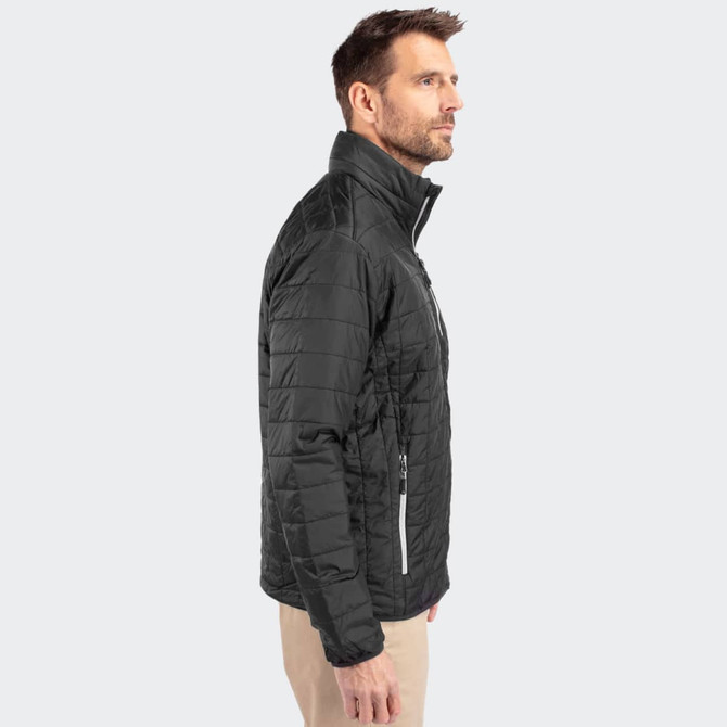 A men's jacket in black with a sleek design, featuring a high collar and zippered pockets. It has a logo on the chest.