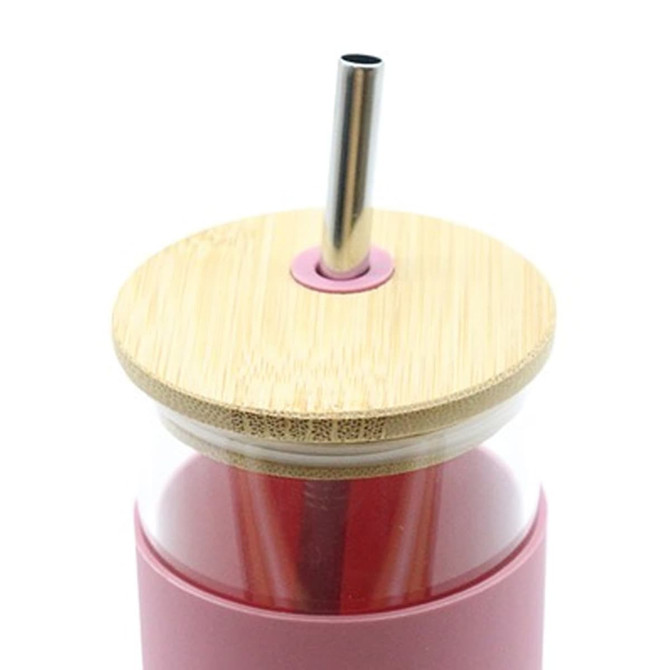 A drink bottle with a pink sleeve, bamboo lid, and a metal straw. It features a logo on the side.