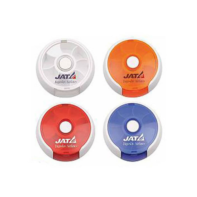 A set of four circular pill boxes in white, orange, red, and blue, each featuring a logo.