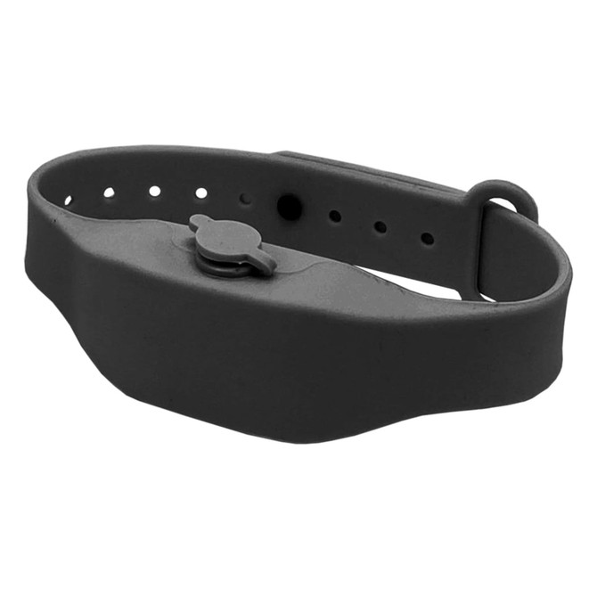 A black wristband hand sanitiser dispenser with an adjustable strap and a button for dispensing sanitiser.