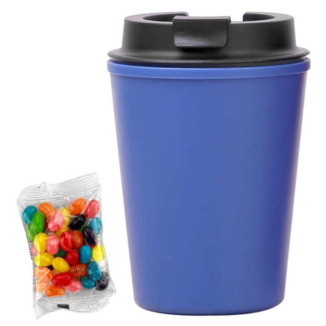 A drink bottle in a deep blue colour with a black lid, accompanied by a bag of colourful jelly beans.