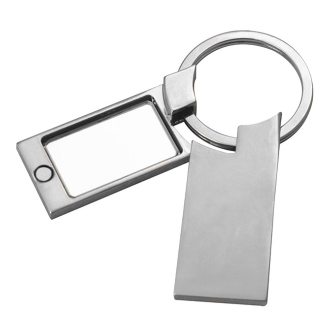A metallic key ring with a rectangular frame and a flat tag, featuring a smooth silver finish.