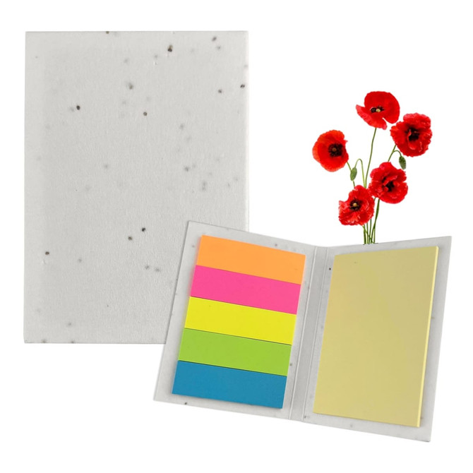A sticky note pad with a speckled white cover, featuring bright pink, orange, green, and blue sticky notes, alongside red poppy flowers.