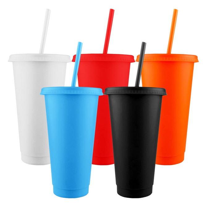 A collection of solid-coloured tumblers in white, blue, red, orange, and black, each with a matching straw.