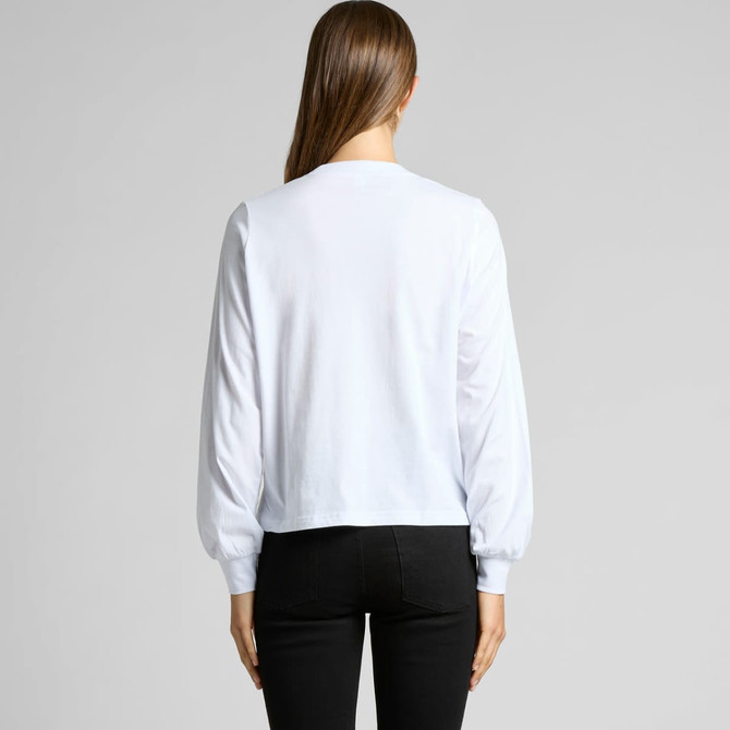 A white long-sleeve t-shirt with puffed sleeves, viewed from the back, paired with black pants.