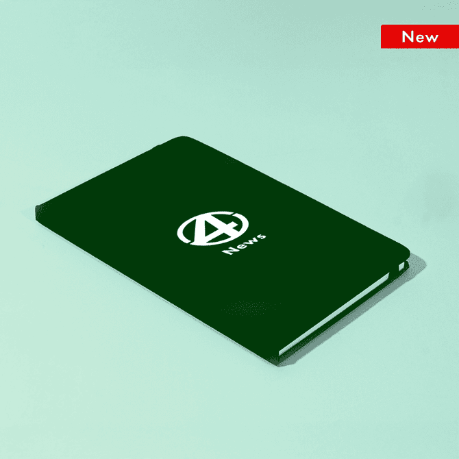 A green A5 notebook with a logo on the cover, featuring a band closure and a plain interior.