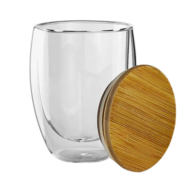 A drink bottle featuring a clear double wall glass cup with a bamboo lid. The cup has a sleek, modern design.