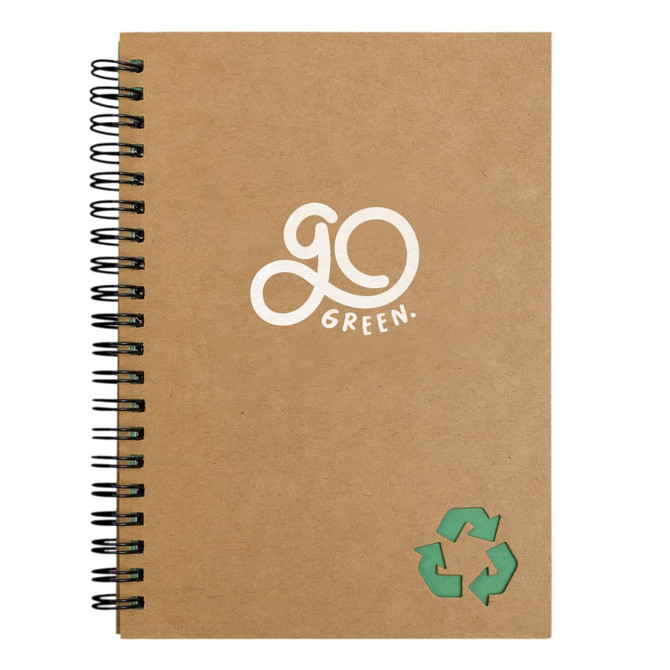 A brown spiral-bound notebook with a green recycling symbol and a logo on the cover.