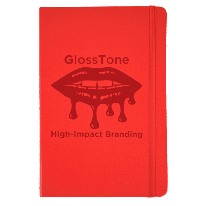 A red journal with a glossy finish and a logo on the front, featuring a design of lips and dripping effect.
