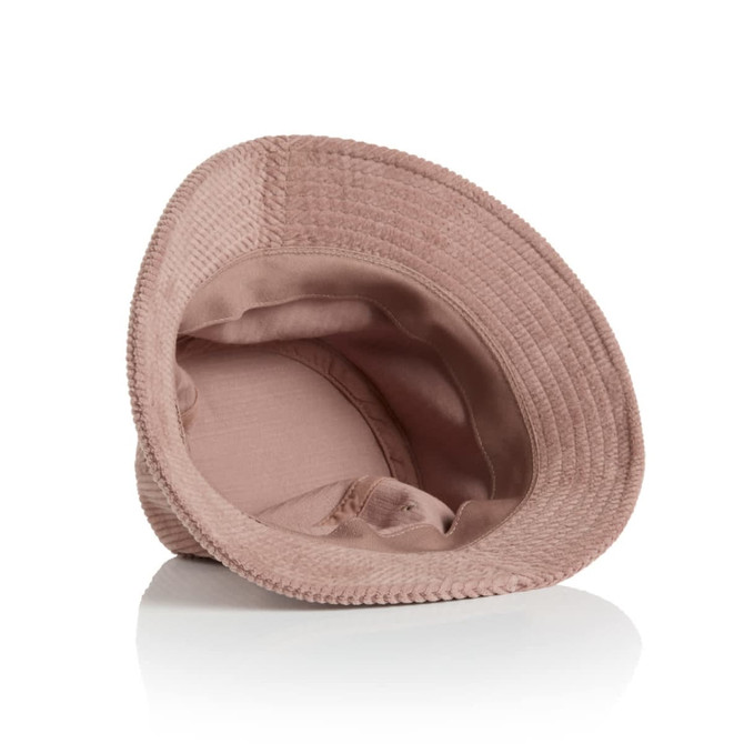 A pink Cord Bucket Hat with a wide brim and an interior lining, featuring a logo inside.