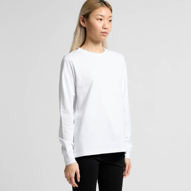 A long-sleeved white T-shirt on a model, featuring a simple design with a logo.
