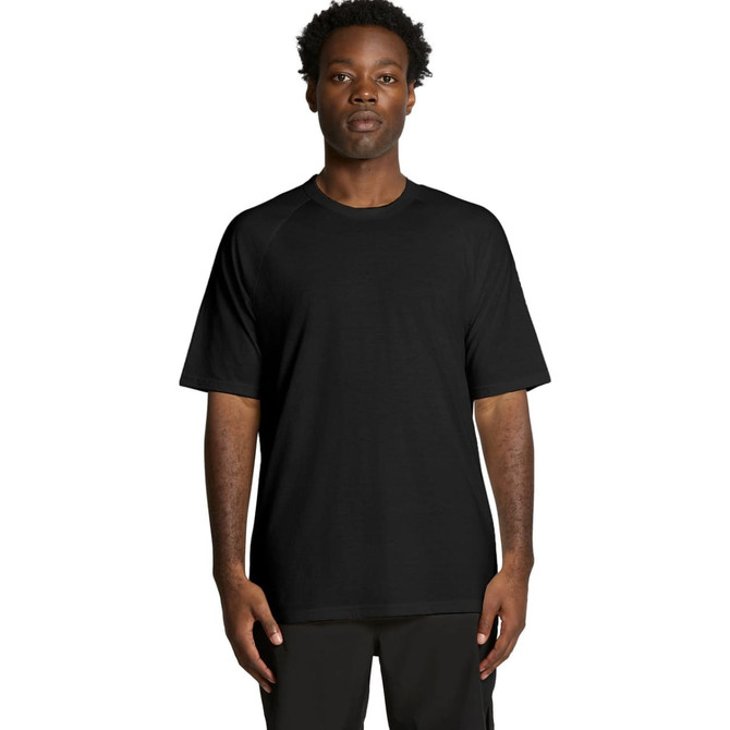 A black T-shirt with short sleeves, featuring a logo, worn by a model standing upright.