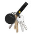 A black SwiftFinder Duo Smart Global Tracker attached to a keyring with several keys. Includes a leather strap.