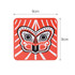A vibrant orange cork coaster featuring a stylised black and white butterfly design, measuring 9cm x 9cm.