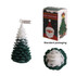 Cedar Christmas tree-shaped candle in green and white, presented in festive packaging featuring a Santa illustration.