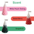 Cedar Christmas tree-shaped candles in pink, red, and green, each labelled with different scents.