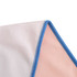 A microfibre beach towel featuring a pink and white design with blue edging, suitable for leisure and outdoor use.