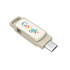 A beige flash drive with a loop for attaching to keys and a logo on the side.