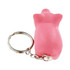 A pink mini pig stress item attached to a keyring, featuring a metal chain and keyring.