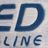Acrylic fibre logo mat in grey and blue, featuring a prominent logo design.