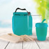 A turquoise picnic pack containing a drink bottle, reusable cup, cutlery, and meal containers.