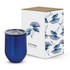A drink bottle in a deep blue hue with a clear lid, next to a floral patterned box. The box features a logo.