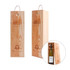 A wooden wine box in natural finish with a rope handle, designed to hold a single bottle. Contains a logo.