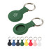 A green silicone protective case for an Air Tag, featuring a keyring, alongside various coloured cases.