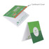 Custom shaped sticky note memo pads with a green and white cardboard cover, featuring a logo.